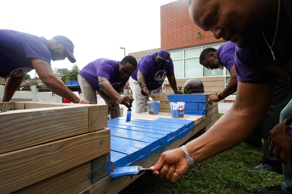 Governor Roy Cooper joined more than 200 members of the Omega Psi Phi Fraternity, Inc. on the Renaissance West Community Initiative Campus for the Fraternity’s Day of Service as part of its 83rd International Grand Conclave held in Charlotte this year.